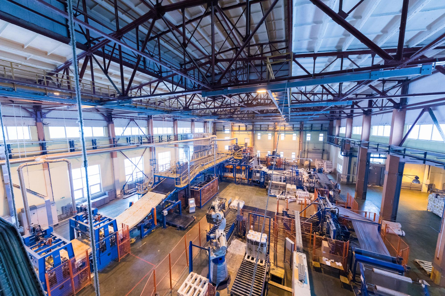 Wide interior view of an industrial manufacturing facility floor